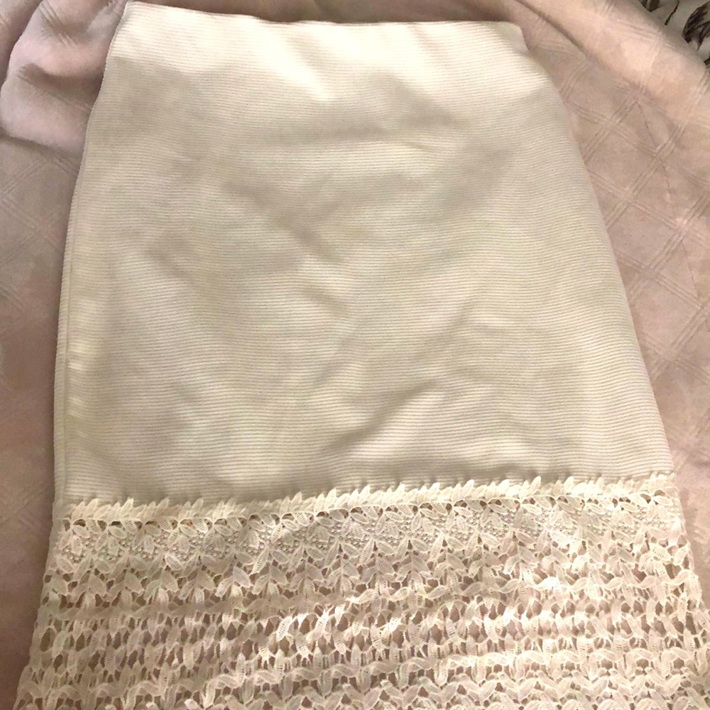Cream color skirt with fun hem detail